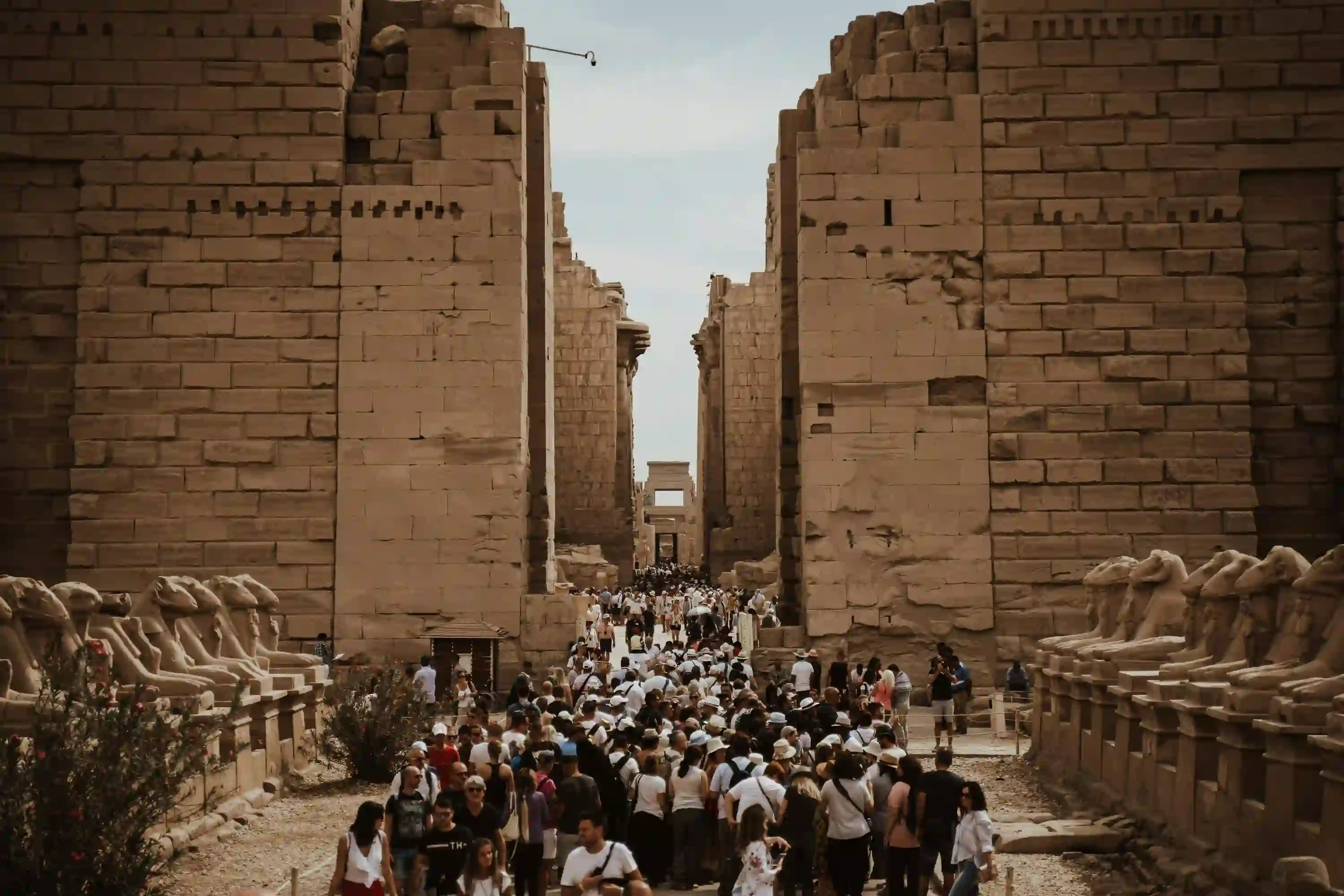 Tourists walking among ancient temples