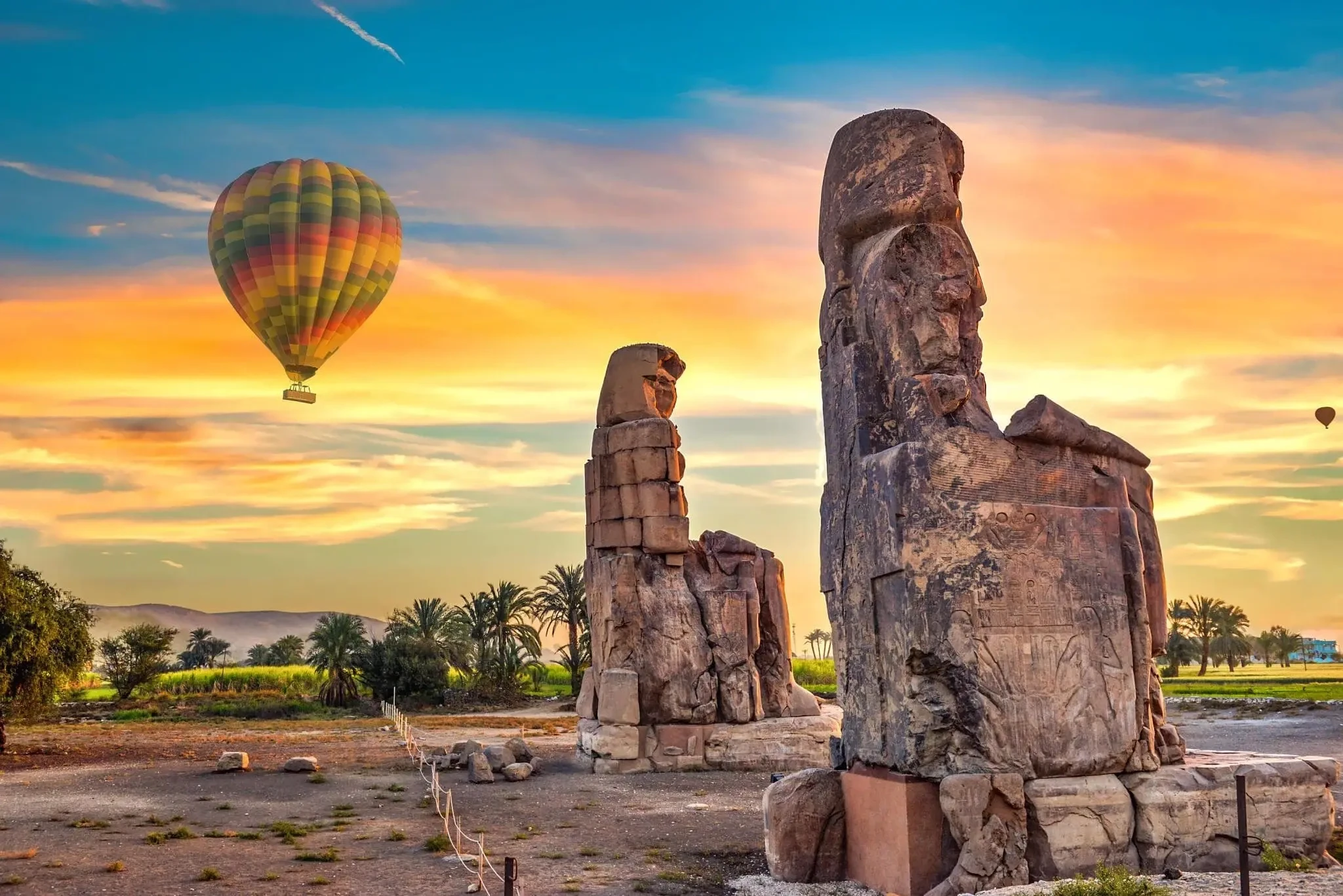 The Colossi of Memnon standing on the West Bank of Luxor